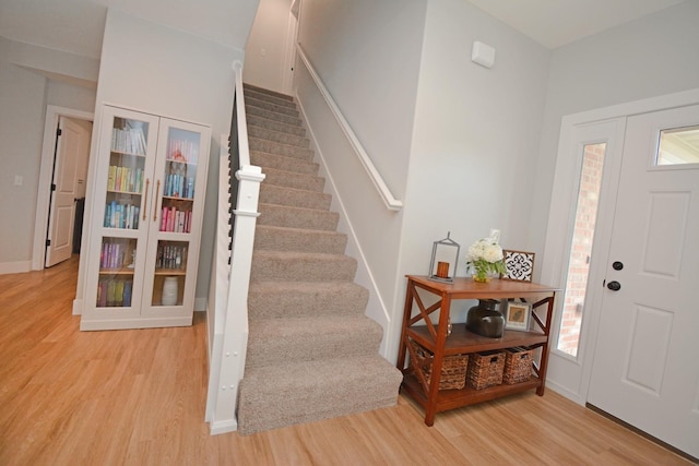 1723 Glenbridge Rd, Bloomington, IL 61704 - entrance foyer featuring light wood-style flooring and stairs