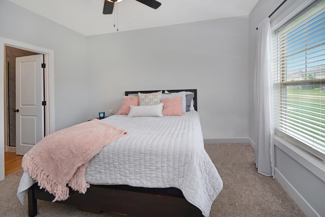 1723 Glenbridge Rd, Bloomington, IL 61704 - carpeted bedroom with ceiling fan and baseboards