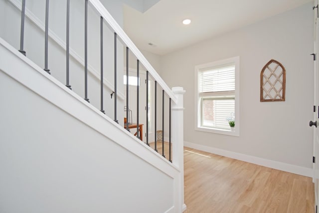 1723 Glenbridge Rd, Bloomington, IL 61704 - entrance foyer with wood finished floors, stairs, and recessed lighting