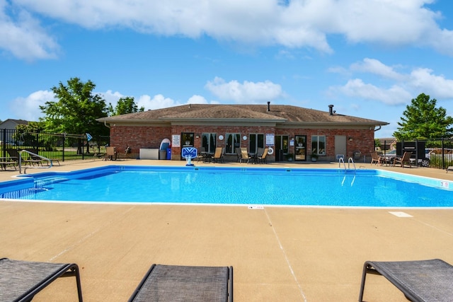 1723 Glenbridge Rd, Bloomington, IL 61704 - community pool featuring a patio area