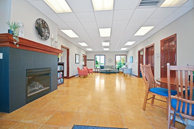 1723 Glenbridge Rd, Bloomington, IL 61704 - living room with a drop ceiling and a fireplace