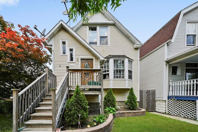 5044 W Roscoe St, Chicago, IL 60641 - rear view of property with stairway and a yard