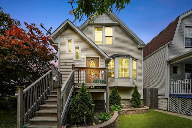 5044 W Roscoe St, Chicago, IL 60641 - rear view of property with stairs and a lawn