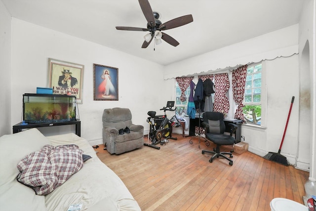 5044 W Roscoe St, Chicago, IL 60641 - home office with wood-type flooring and a ceiling fan