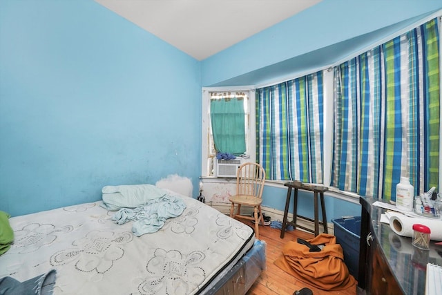 5044 W Roscoe St, Chicago, IL 60641 - bedroom featuring wood finished floors and cooling unit