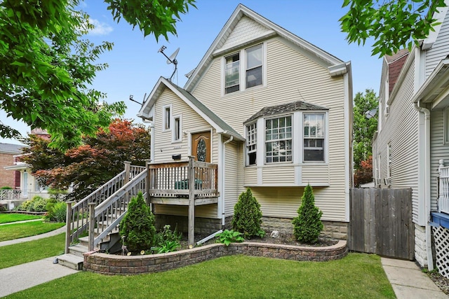 5044 W Roscoe St, Chicago, IL 60641 - view of front of property featuring a wooden deck and stairway