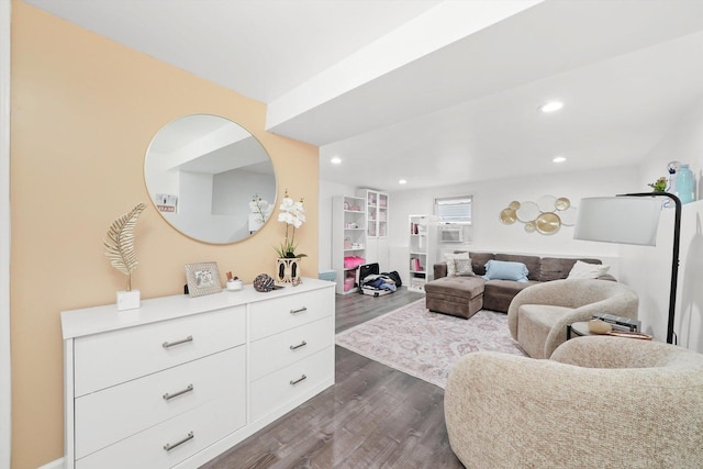 5044 W Roscoe St, Chicago, IL 60641 - living area with dark wood-style flooring, recessed lighting, and cooling unit
