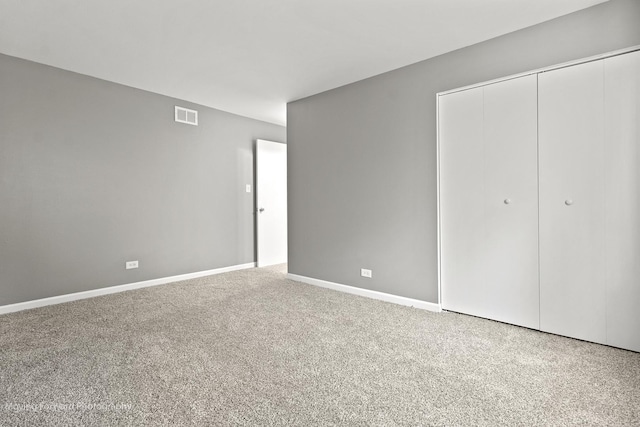 1249 Cunningham Dr Unit 2E, Calumet City, IL 60409 - unfurnished bedroom featuring a closet and carpet