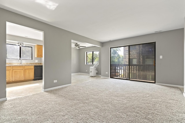 1249 Cunningham Dr Unit 2E, Calumet City, IL 60409 - empty room featuring light colored carpet, light tile patterned floors, and ceiling fan