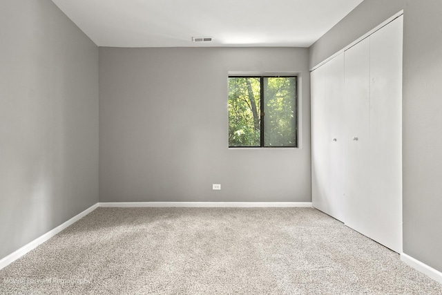 1249 Cunningham Dr Unit 2E, Calumet City, IL 60409 - unfurnished bedroom with carpet flooring and a closet