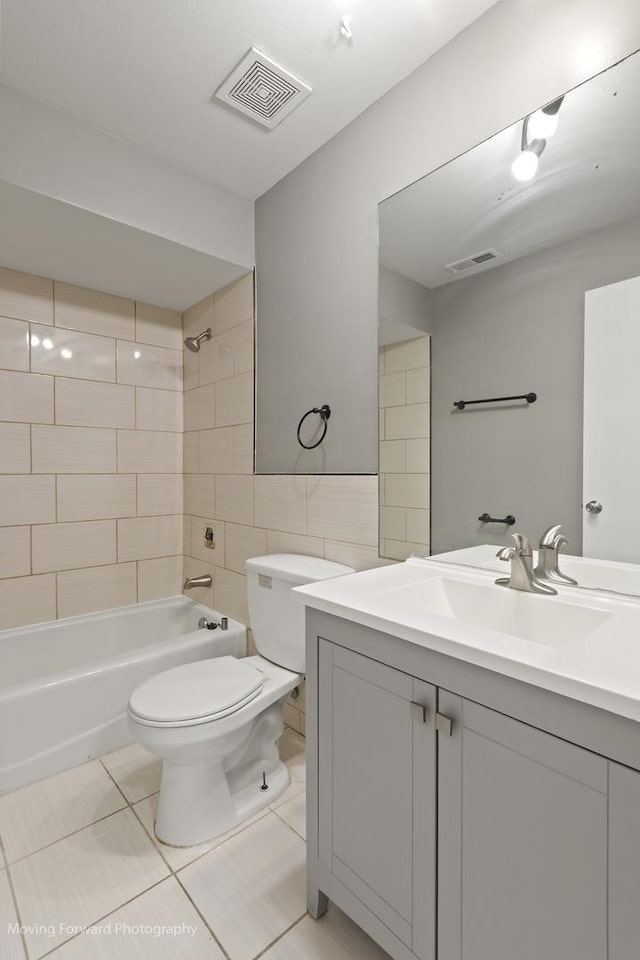 1249 Cunningham Dr Unit 2E, Calumet City, IL 60409 - full bath featuring tile patterned flooring, vanity, tile walls, and shower / bath combination
