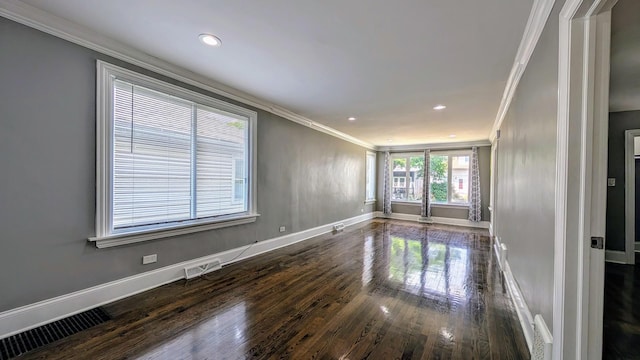 5937 W Eastwood Ave, Chicago, IL 60630 - empty room with crown molding, wood finished floors, and recessed lighting