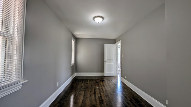 5937 W Eastwood Ave, Chicago, IL 60630 - empty room featuring plenty of natural light and wood finished floors