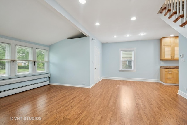 2111 Lake Ave, Wilmette, IL 60091 - unfurnished living room featuring light wood-type flooring, healthy amount of natural light, recessed lighting, and baseboard heating