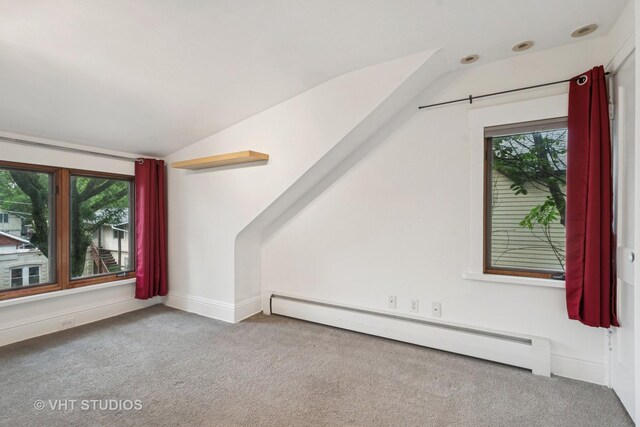 2111 Lake Ave, Wilmette, IL 60091 - bonus room featuring baseboard heating, vaulted ceiling, and carpet floors