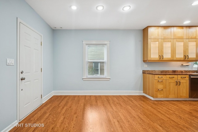 2111 Lake Ave, Wilmette, IL 60091 - kitchen with light wood-type flooring, glass insert cabinets, dishwasher, dark countertops, and recessed lighting