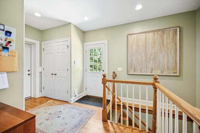 1054 Seneca Rd, Wilmette, IL 60091 - entryway with wood finished floors and recessed lighting