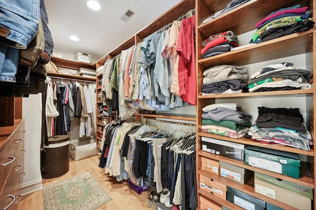 1054 Seneca Rd, Wilmette, IL 60091 - walk in closet with light wood finished floors