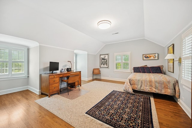 1054 Seneca Rd, Wilmette, IL 60091 - bedroom featuring wood finished floors, vaulted ceiling, a desk, and crown molding