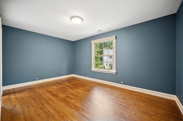 1054 Seneca Rd, Wilmette, IL 60091 - empty room with wood finished floors