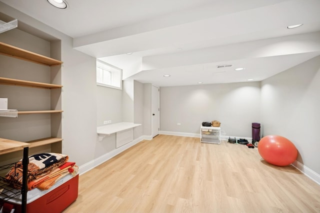 1054 Seneca Rd, Wilmette, IL 60091 - exercise area featuring light wood-style floors and recessed lighting