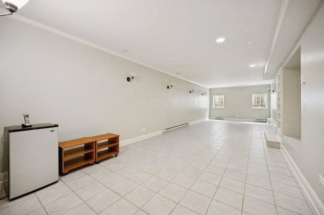 1054 Seneca Rd, Wilmette, IL 60091 - empty room featuring a baseboard heating unit, ornamental molding, light tile patterned floors, and recessed lighting