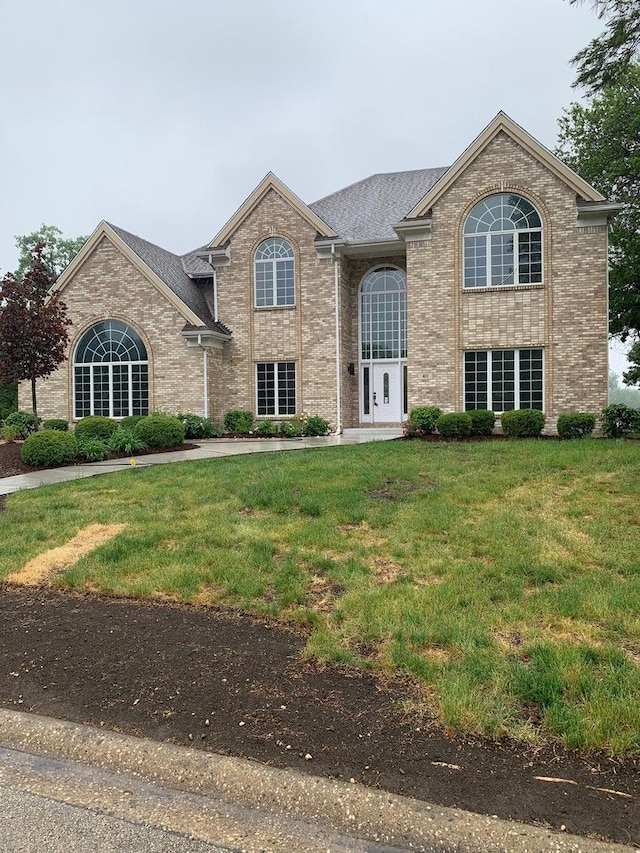 411 Westridge Rd, Joliet, IL 60431 - view of front of home featuring a front lawn and brick siding