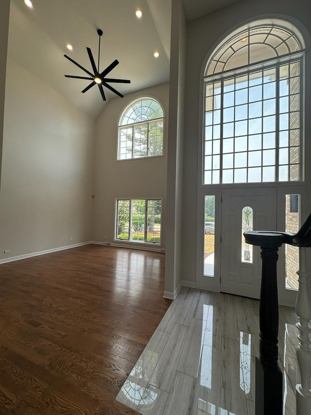 411 Westridge Rd, Joliet, IL 60431 - foyer featuring high vaulted ceiling, wood finished floors, ceiling fan, and recessed lighting