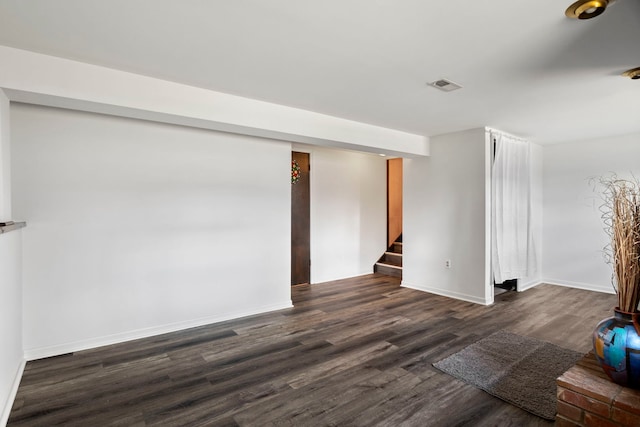 440 Charles Ct, South Elgin, IL 60177 - spare room with stairway and dark wood-type flooring