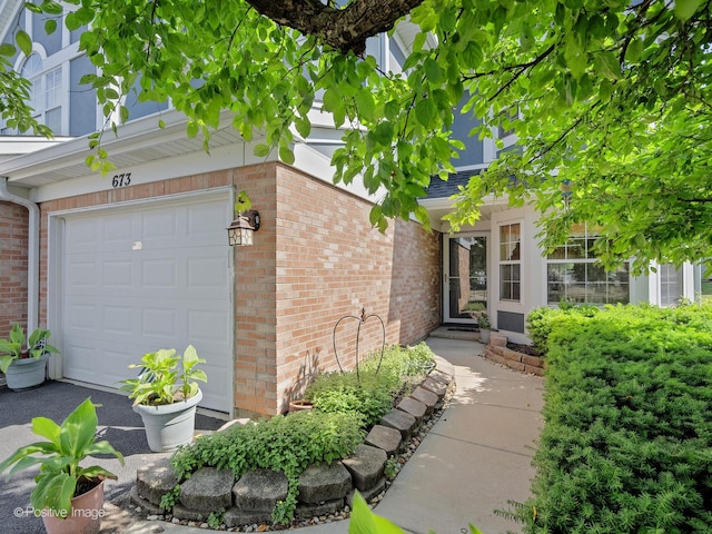 673 Kingsbridge Dr, Carol Stream, IL 60188 - doorway to property featuring brick siding