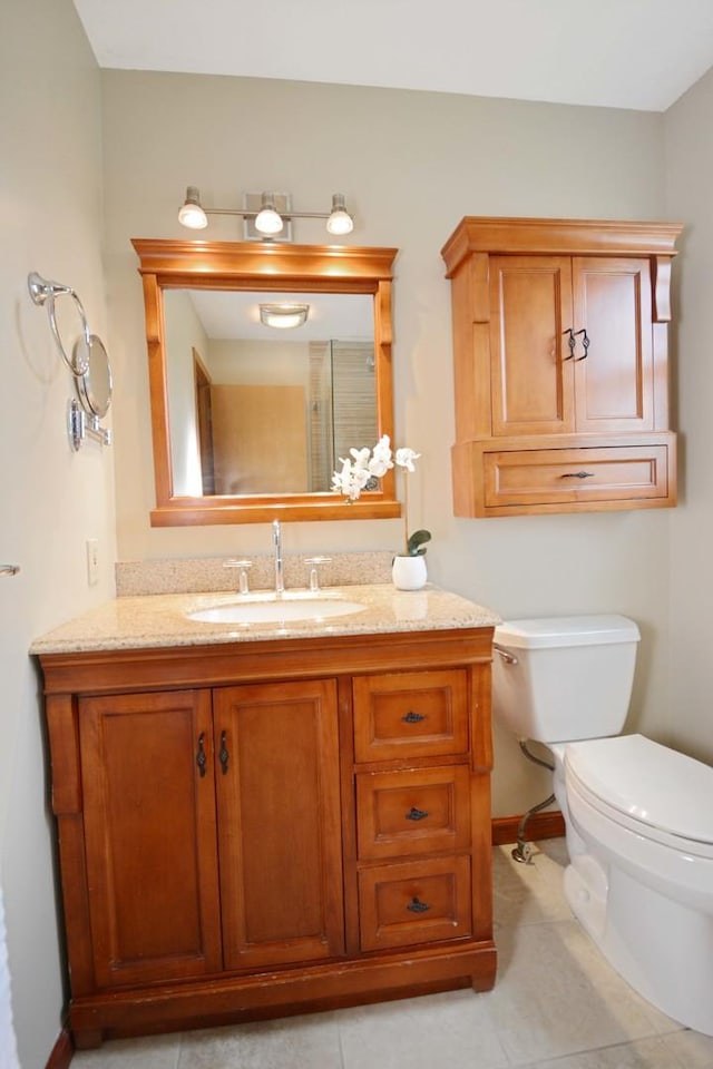708 Wheeler Dr, Hudson, IL 61748 - bathroom with vanity and tile patterned flooring