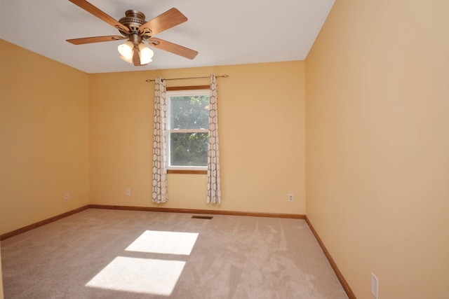708 Wheeler Dr, Hudson, IL 61748 - empty room with carpet flooring and a ceiling fan