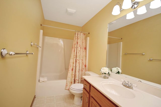 708 Wheeler Dr, Hudson, IL 61748 - bathroom with vanity, shower / tub combo with curtain, and tile patterned floors