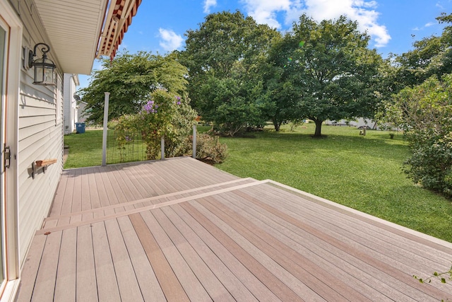 708 Wheeler Dr, Hudson, IL 61748 - deck with a lawn