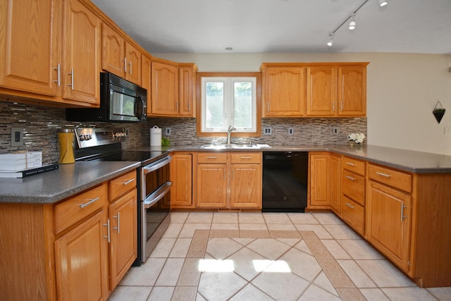 708 Wheeler Dr, Hudson, IL 61748 - kitchen featuring black appliances, light tile patterned floors, a peninsula, and decorative backsplash
