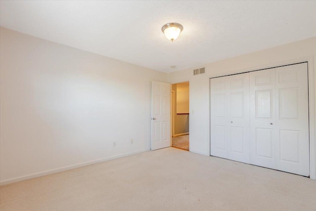 516 Wild Turkey Ln, Normal, IL 61761 - unfurnished bedroom with carpet floors and a closet