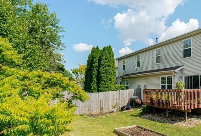 516 Wild Turkey Ln, Normal, IL 61761 - back of property with a wooden deck