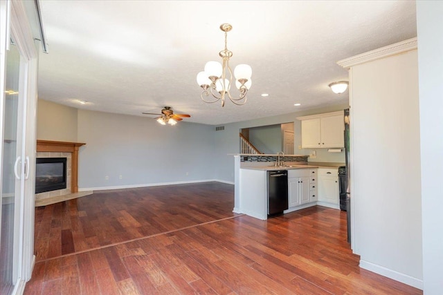 516 Wild Turkey Ln, Normal, IL 61761 - kitchen featuring dishwasher, a chandelier, a ceiling fan, white cabinetry, and dark wood-style flooring