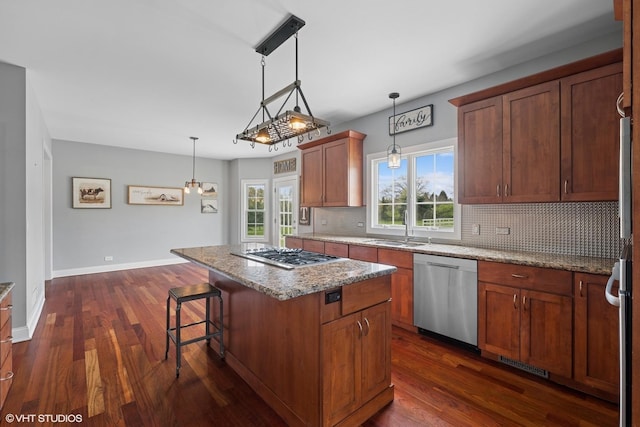 7271 Orchard Valley Dr, Bull Valley, IL 60050 - kitchen with stainless steel appliances, backsplash, dark wood finished floors, and a center island