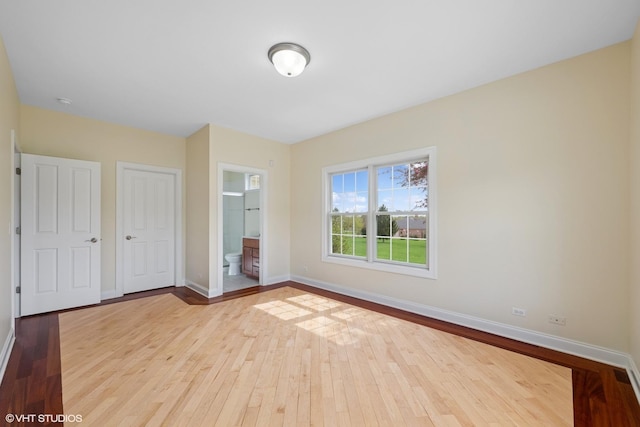 7271 Orchard Valley Dr, Bull Valley, IL 60050 - unfurnished bedroom with wood finished floors and ensuite bath