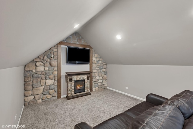 7271 Orchard Valley Dr, Bull Valley, IL 60050 - carpeted living area with vaulted ceiling and a stone fireplace