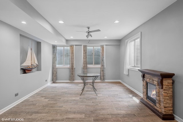 7271 Orchard Valley Dr, Bull Valley, IL 60050 - unfurnished dining area featuring ceiling fan, recessed lighting, wood finished floors, and a fireplace