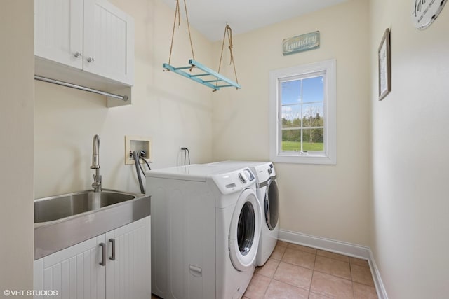 7271 Orchard Valley Dr, Bull Valley, IL 60050 - laundry area featuring cabinet space, washer and dryer, and light tile patterned floors