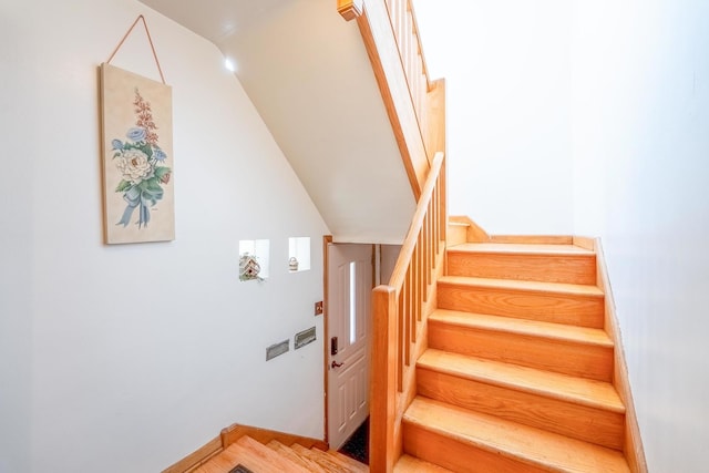 2418 S 58th Ave, Cicero, IL 60804 - staircase featuring vaulted ceiling and wood finished floors