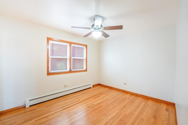 2418 S 58th Ave, Cicero, IL 60804 - unfurnished room featuring a baseboard radiator, light wood-type flooring, and ceiling fan