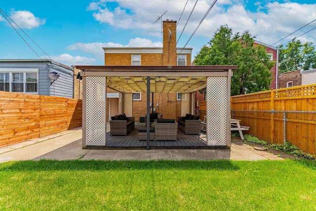 2418 S 58th Ave, Cicero, IL 60804 - rear view of property featuring outdoor lounge area, a fenced backyard, a chimney, and a patio