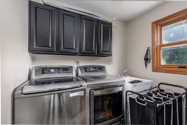 2020 Autumnwood Dr, Ottawa, IL 61350 - laundry area featuring washing machine and dryer and cabinet space