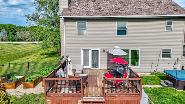 2020 Autumnwood Dr, Ottawa, IL 61350 - back of house featuring a hot tub, a wooden deck, a chimney, roof with shingles, and a vegetable garden