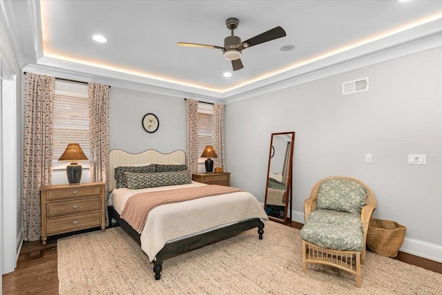657 W Melrose St Unit 2, Chicago, IL 60657 - bedroom with a raised ceiling, recessed lighting, wood finished floors, and a ceiling fan