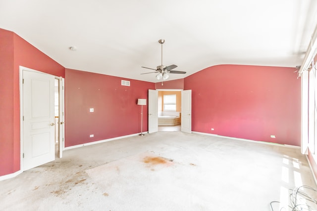 24625 Woodstock Dr, Plainfield, IL 60585 - carpeted empty room with lofted ceiling, ceiling fan, and a smoke detector